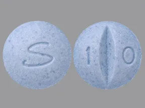 This medicine is a blue, round, scored, tablet imprinted with 