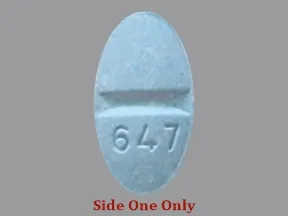 This medicine is a dark blue, oval, scored, tablet imprinted with 