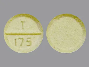 This medicine is a light yellow, round, scored, tablet imprinted with 