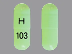 This medicine is a light green, oblong, capsule imprinted with 