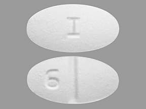 CBR07010: This medicine is a white, oval, scored, film-coated, tablet impri...
