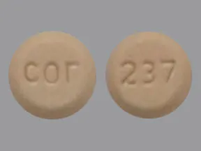 This medicine is a light orange, round, tablet imprinted with 