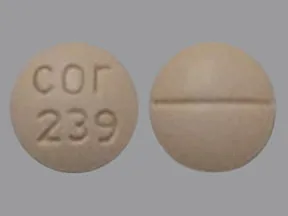 This medicine is a light orange, round, scored, tablet imprinted with 