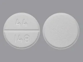 This medicine is a white, round, scored, tablet imprinted with. 