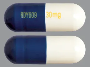 DRR06090: This medicine is a white blue, oblong, capsule imprinted with &qu...