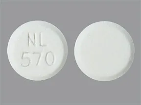 This medicine is a white, round, grape, chewable tablet imprinted with 