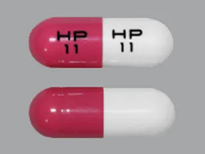 This medicine is a pink white, oblong, gelatin coated, capsule imprinted with 