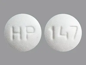 This medicine is a white, round, tablet imprinted with 