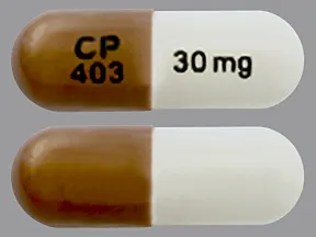 This medicine is a white brown, oblong, capsule imprinted with 
