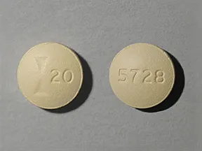 This medicine is a beige, round, film-coated, tablet imprinted with 