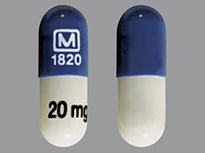 This medicine is a medium blue white, oblong, capsule imprinted with 