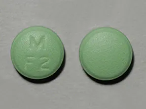 This medicine is a green, round, film-coated, tablet imprinted with 