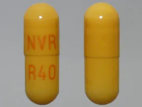This medicine is a light brown, oblong, capsule imprinted with 