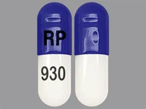 This medicine is a blue violet white, oblong, capsule imprinted with 