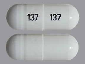 This medicine is a white, oblong, capsule imprinted with 