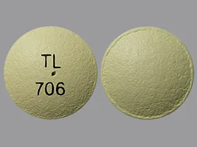 This medicine is a yellow, round, tablet imprinted with 
