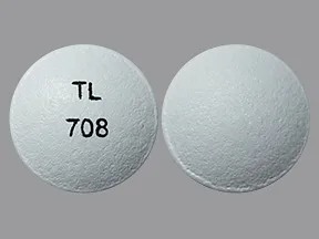 This medicine is a white, round, tablet imprinted with 