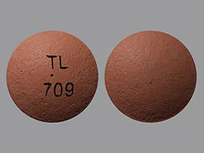This medicine is a pink, round, tablet imprinted with 