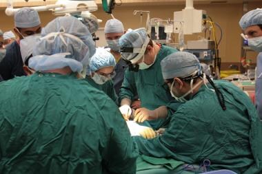 The donor limb is dissected out simultaneously wit