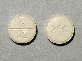 This medicine is a light orange, round, scored, tablet imprinted with "G  32" and "250".