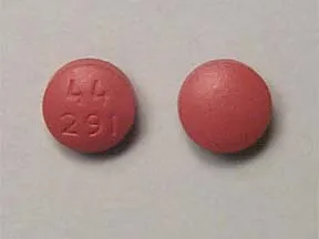 This medicine is a brown, round, film-coated, tablet imprinted with "44  291".