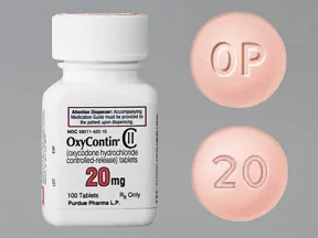 This medicine is a pink, round, film-coated, tablet imprinted with "OP" and "20".