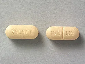 This medicine is a light yellow, oblong, scored, film-coated, tablet imprinted with "ZOLOFT" and "100 MG".