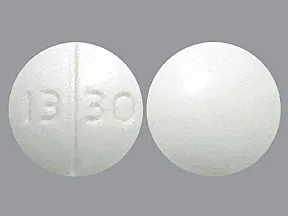 This medicine is a white, round, scored, tablet imprinted with "13 30".