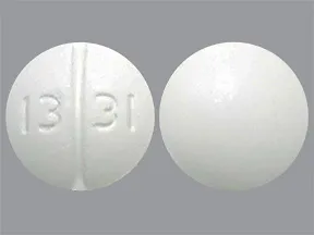 This medicine is a white, round, scored, tablet imprinted with "13 31".