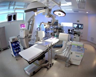 Modern operating room setup for spine surgery with