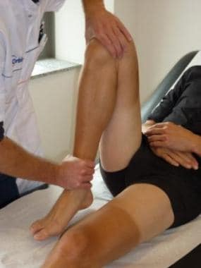Passive hyperflexion of the knee. 