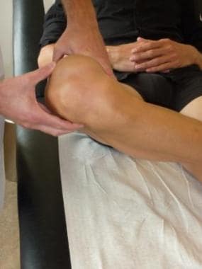 Palpating the lateral collateral ligament in later