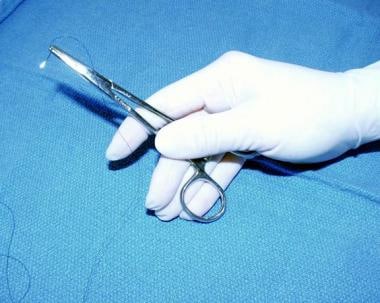Needle holder is held in palm, allowing greater de