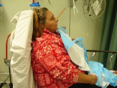 Patient sitting in an appropriate, upright positio