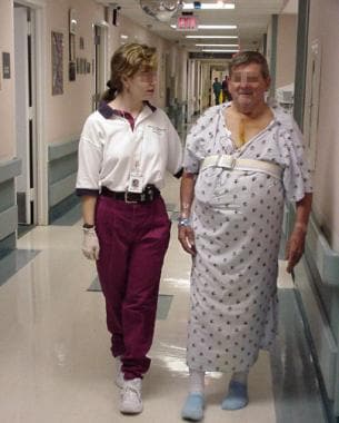 Phase 1: A patient walking in the hallway with a p