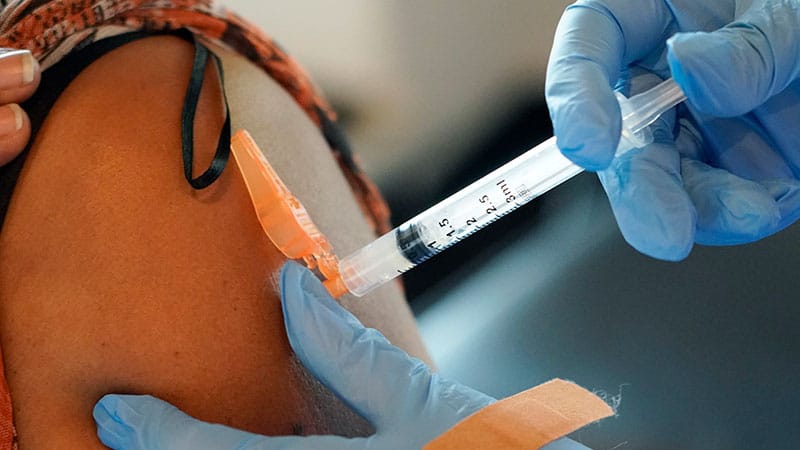 Biden Vaccine Mandate Splits US on Party Lines: AP-NORC Poll