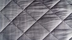 Weighted Blankets Promote Melatonin Release, May Improve Sleep