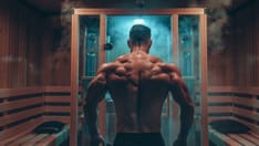 photo of Muscular man relaxing in a modern sauna.