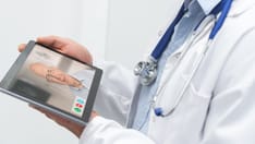 photo of Telemedicine, a concept of remote healthcare. Medical consultation between a doctor and a senior patient.