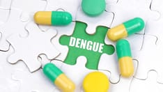photo of Medicine concept. There are pills and vitamins on the white puzzles. Inside on a green background the inscription - 