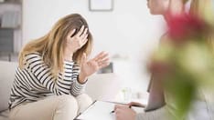 photo of Exhausted woman at psychology clinic. Exhausted women at psychology clinic, having nervous breakdown feeling hopeles