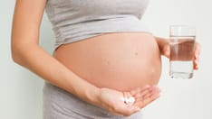 photo of Pregnancy, people and health care concept - pregnancy closure vitamins and minerals for pregnant women Taking medica