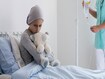 photo of a sick child in bed