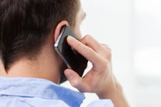 photo of man on the phone