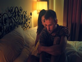 photo of a couple in bed