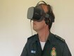 photo of a man wearing a virtual reality headset.