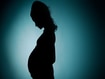photo of Silhouette of pregnant young lady