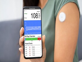 photo of Checking Blood Sugar Level On Smart Phone