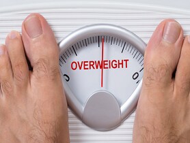 photo of weight scale indicating overweight