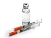 photo of a vial and syringes
